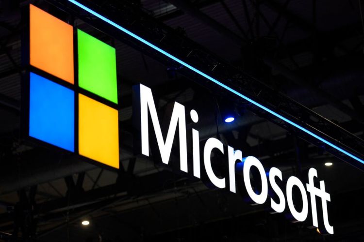 A Microsoft logo is displayed at the MWC (Mobile World Congress) in Barcelona on March 2, 2022. - The Mobile World Congress, where smartphone and telecoms companies show off their latest products and reveal their strategic visions, is expected to welcome more than 40,000 guests over its four-day run. (Photo by Josep LAGO / AFP) (Photo by JOSEP LAGO/AFP via Getty Images)